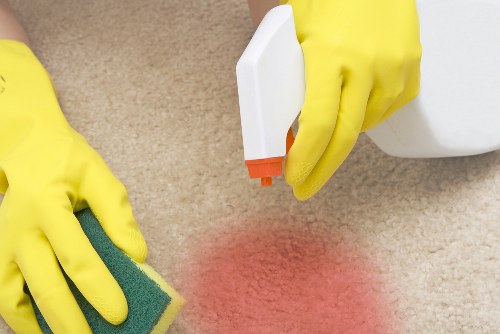 Customer raising a service complaint in a professional cleaning setting