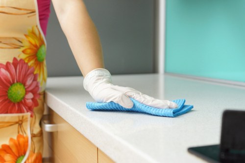Cleaning newly fitted kitchen surfaces after builders work in Putney