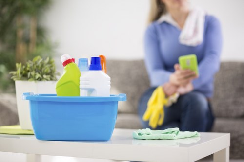Local cleaner preparing a guest-ready bedroom in Putney